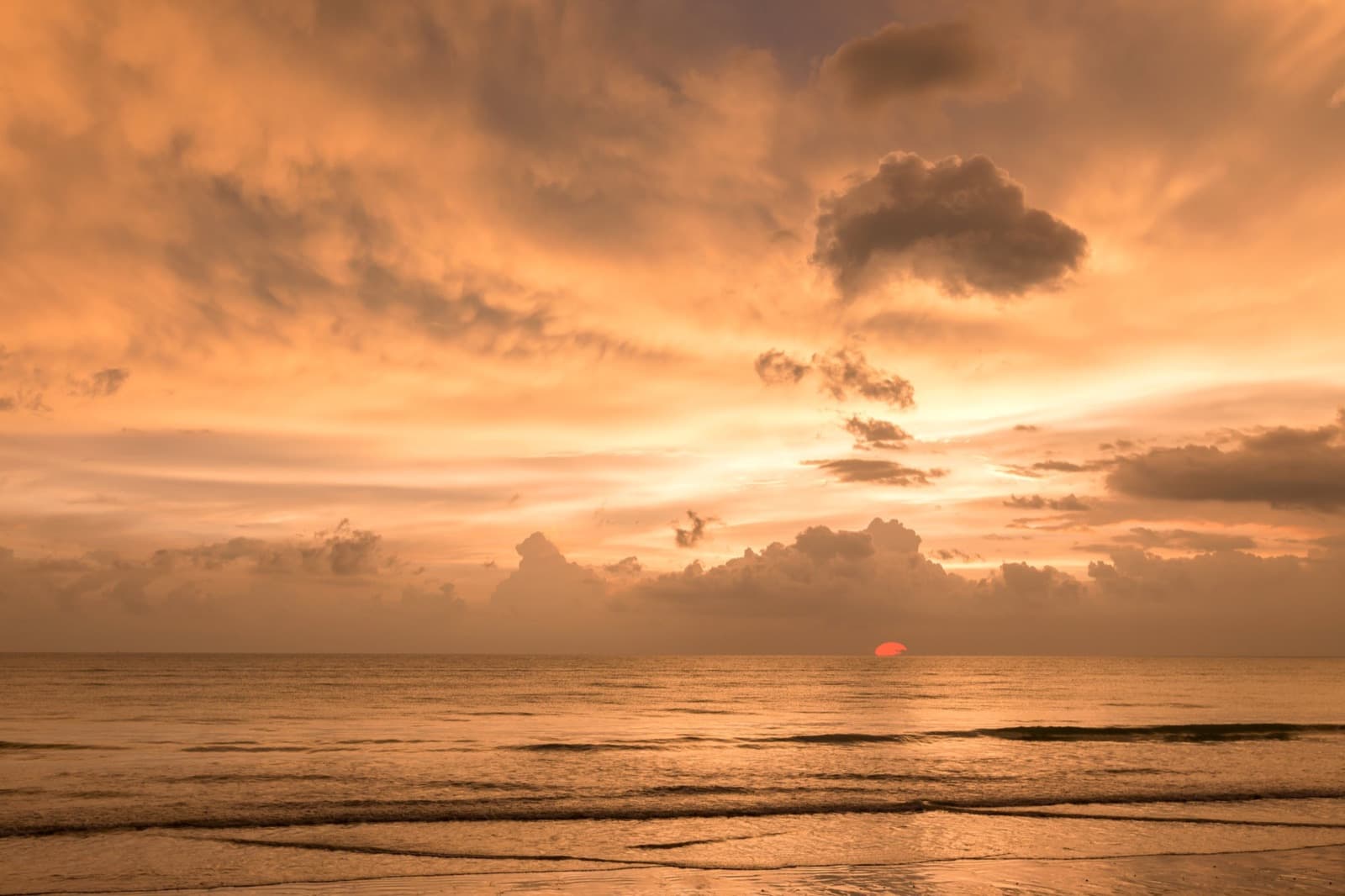 Sunset over the sea seen from Phuket's west coast