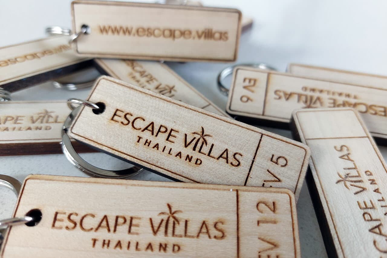 Private pool villa with sun loungers and tropical garden at Escape Villas Phuket