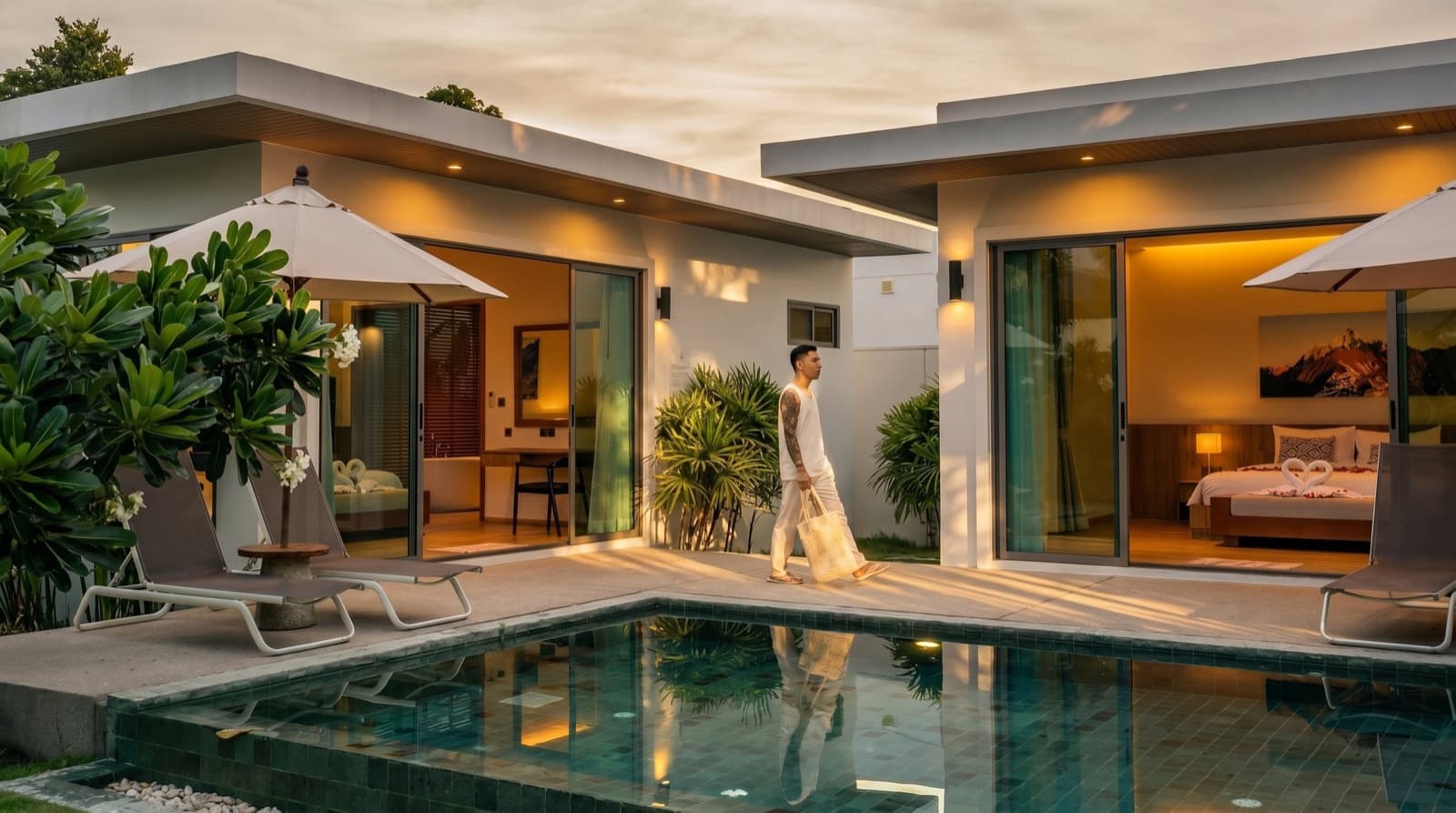 Guest walking through the garden of a private villa in Phuket