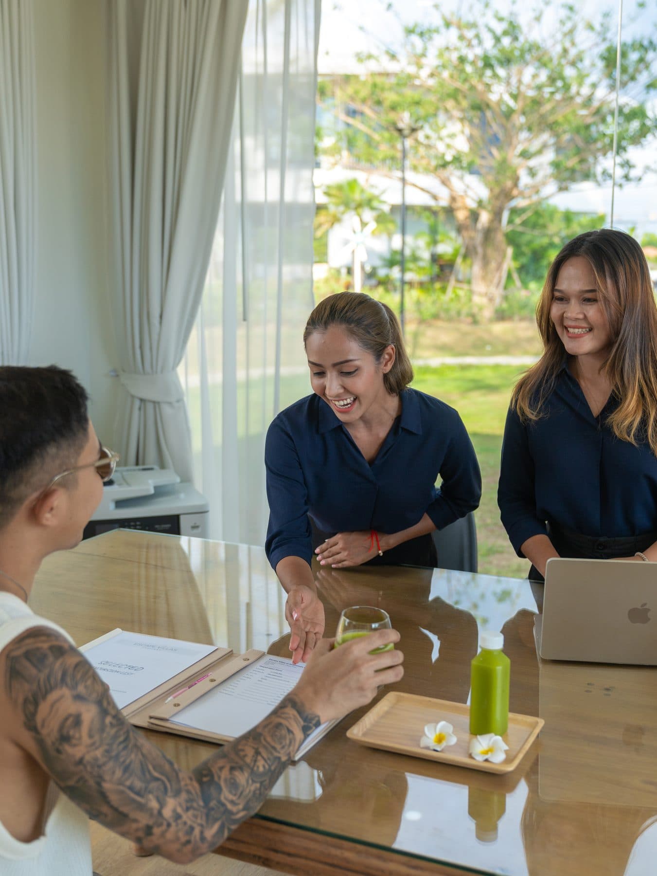 The Escape Villas concierge team welcoming a guest